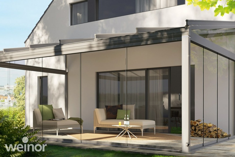 Haus mit angebauter Glasoase