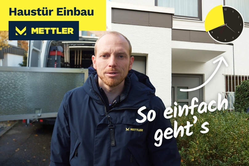 Michael Mettler beim Haustür-Einbau