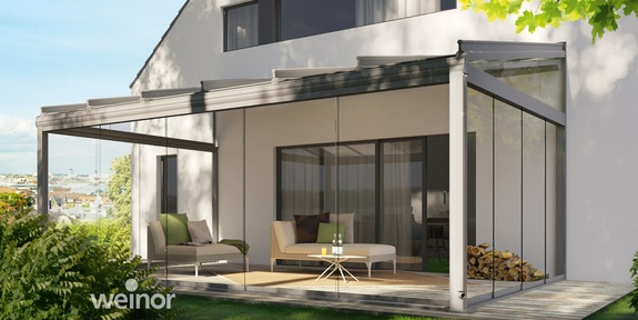 Haus mit angebauter Glasoase